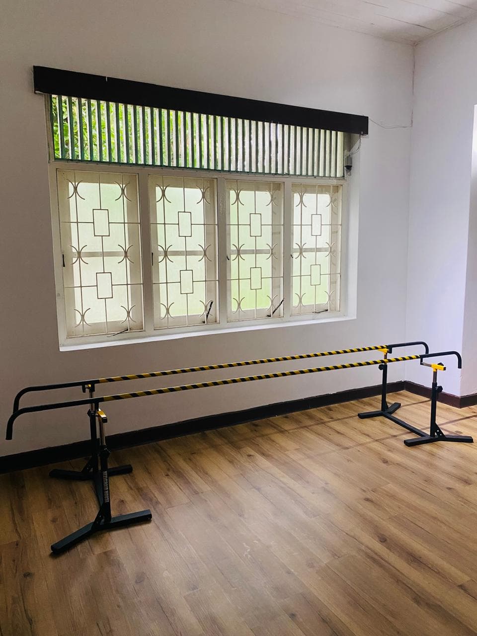 Therapy room with parallel bars