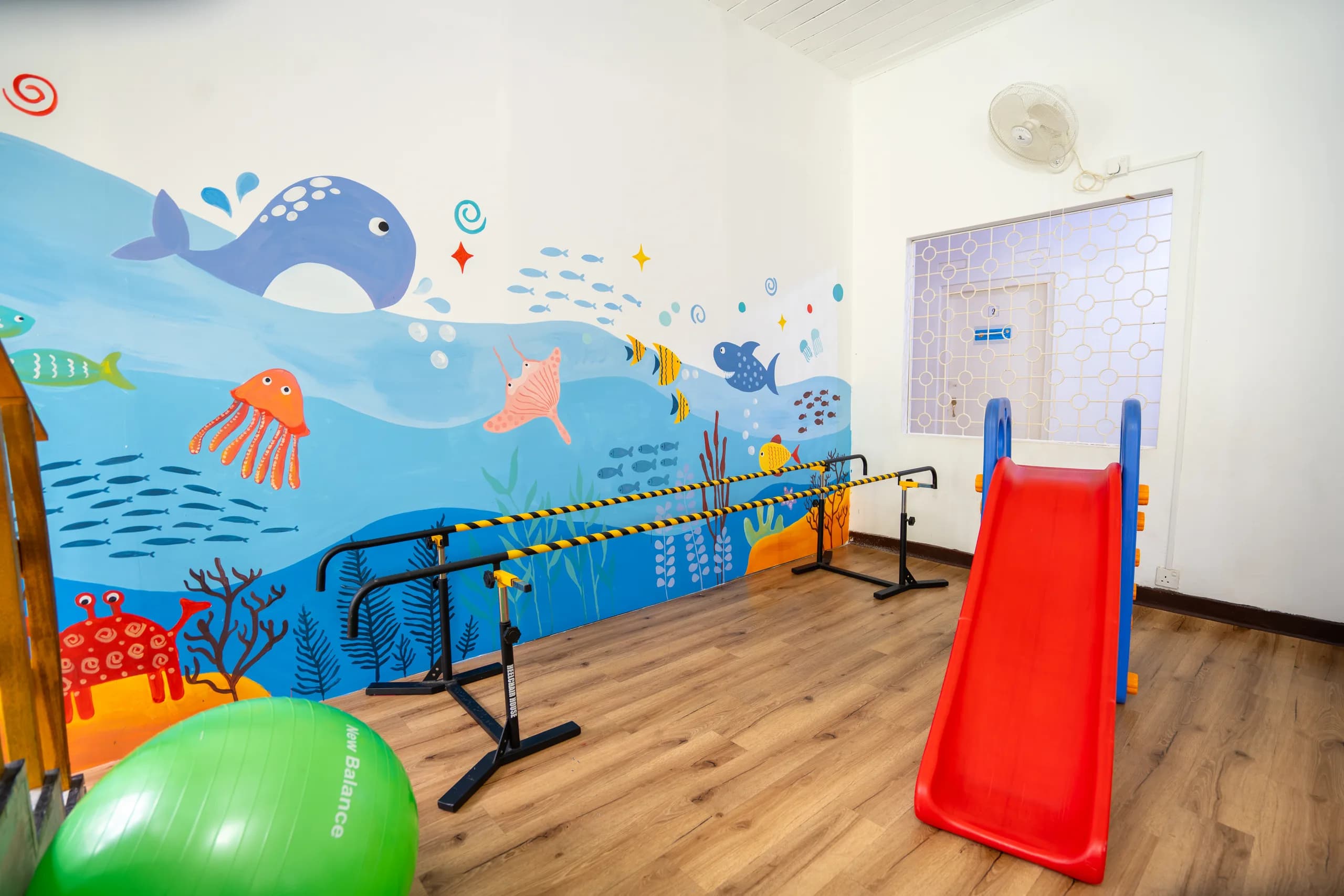 Physiotherapy room with parallel bars